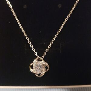 Elegant Silver And Diamond Pendant Necklace